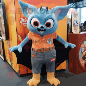 Orange Bat mascot costume character dressed with a Denim Shirt and Lapel pins