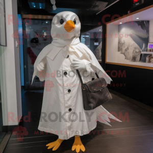 White Blackbird mascot costume character dressed with a Raincoat and Coin purses