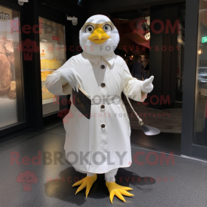 White Blackbird mascot costume character dressed with a Raincoat and Coin purses