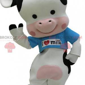 Mascote preto branco e vaca rosa com uma camiseta azul -