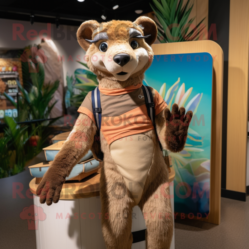 Tan Thylacosmilus mascot costume character dressed with a Board Shorts and Gloves Tan Thylacosmilus mascot costume character dressed with a Board Shorts and Gloves