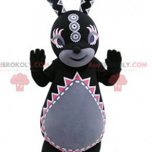 Black and gray rabbit mascot with colorful patterns -
