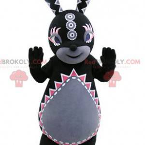 Black and gray rabbit mascot with colorful patterns -