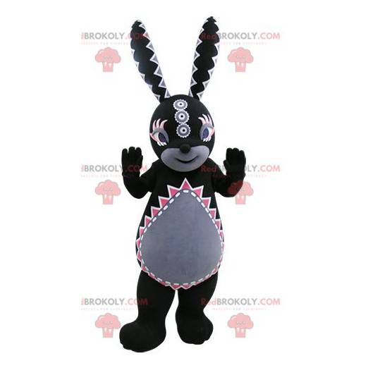 Black and gray rabbit mascot with colorful patterns -