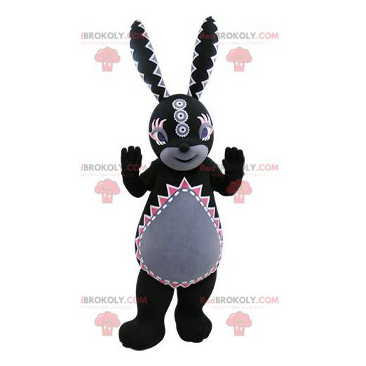 Mascotte de lapin noir et gris avec des motifs colorés -