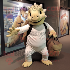 Cream Ankylosaurus mascot costume character dressed with a Joggers and Tote bags