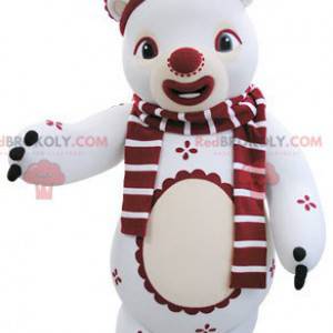 Mascotte de nounours blanc et rouge en tenue d'hiver -