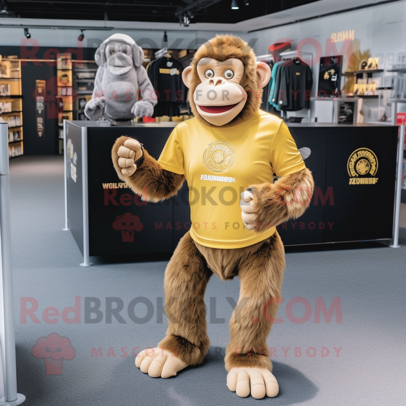 Gold Chimpanzee mascot costume character dressed with a V-Neck Tee and Shoe clips Gold Chimpanzee mascot costume character dressed with a V-Neck Tee and Shoe clips