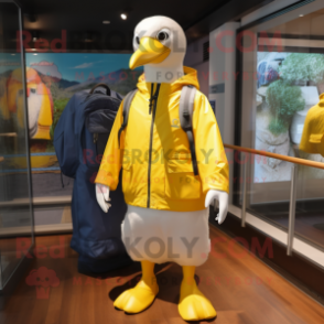 Yellow Albatross mascot costume character dressed with a Windbreaker and Backpacks