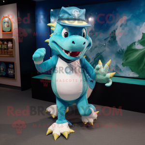 Teal Dragon mascot costume character dressed with a Running Shorts and Hat pins