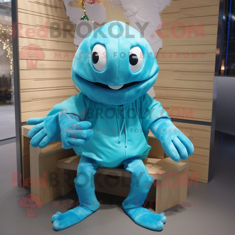 Turquoise Crab mascot costume character dressed with a Hoodie and Keychains