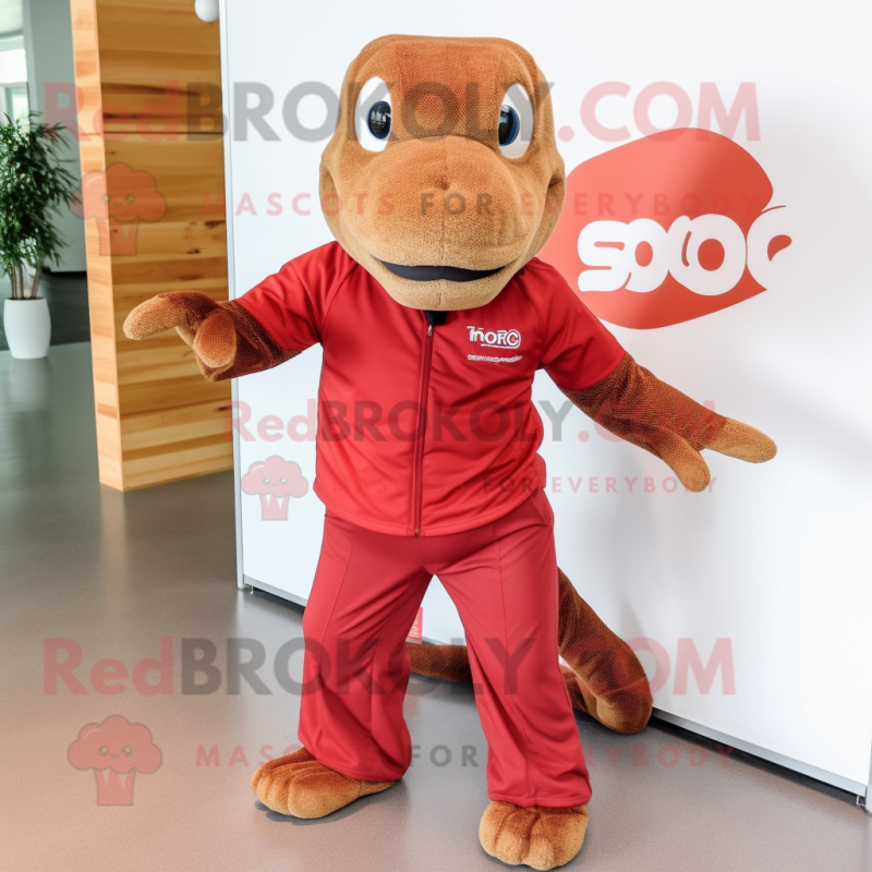 Red Komodo Dragon mascot costume character dressed with a Board Shorts and Bow ties