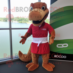 Red Komodo Dragon mascot costume character dressed with a Board Shorts and Bow ties