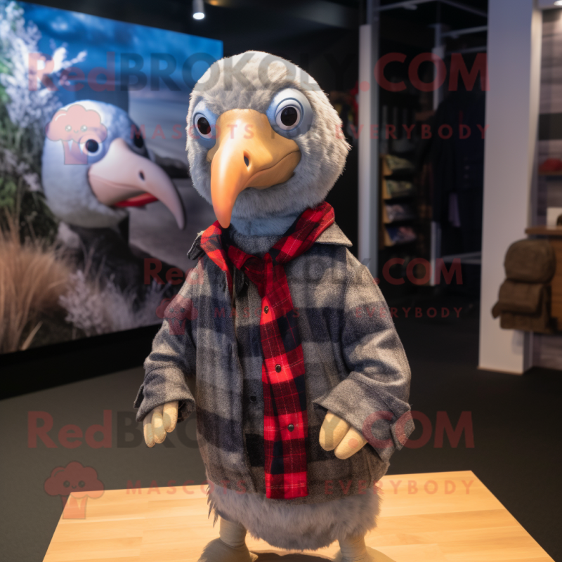 Silver Guinea Fowl mascot costume character dressed with a Flannel Shirt and Beanies