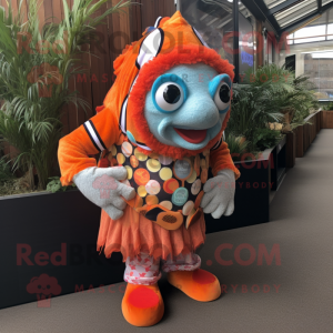 Rust Clown Fish mascot costume character dressed with a Playsuit and Scarves