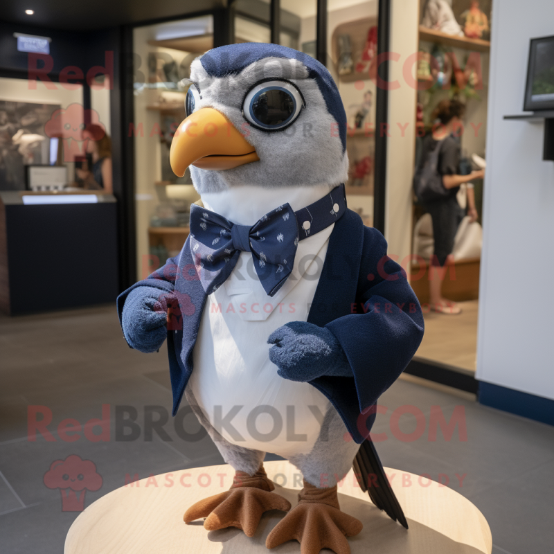 Navy Quail mascot costume character dressed with a Oxford Shirt and Bow ties Navy Quail mascot costume character dressed with a Oxford Shirt and Bow ties
