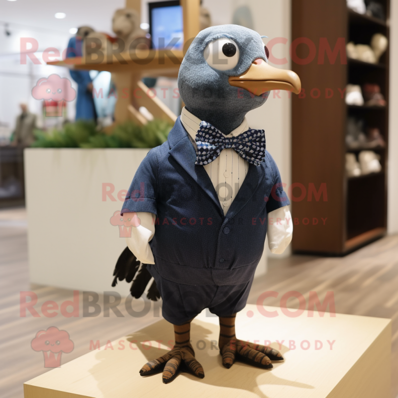 Navy Quail mascot costume character dressed with a Oxford Shirt and Bow ties