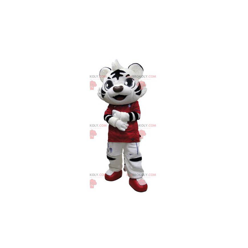 Mascotte de tigre noir et blanc habillé en rouge -