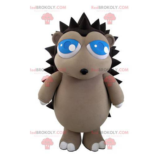 Graues und braunes Igelmaskottchen mit hübschen blauen Augen -