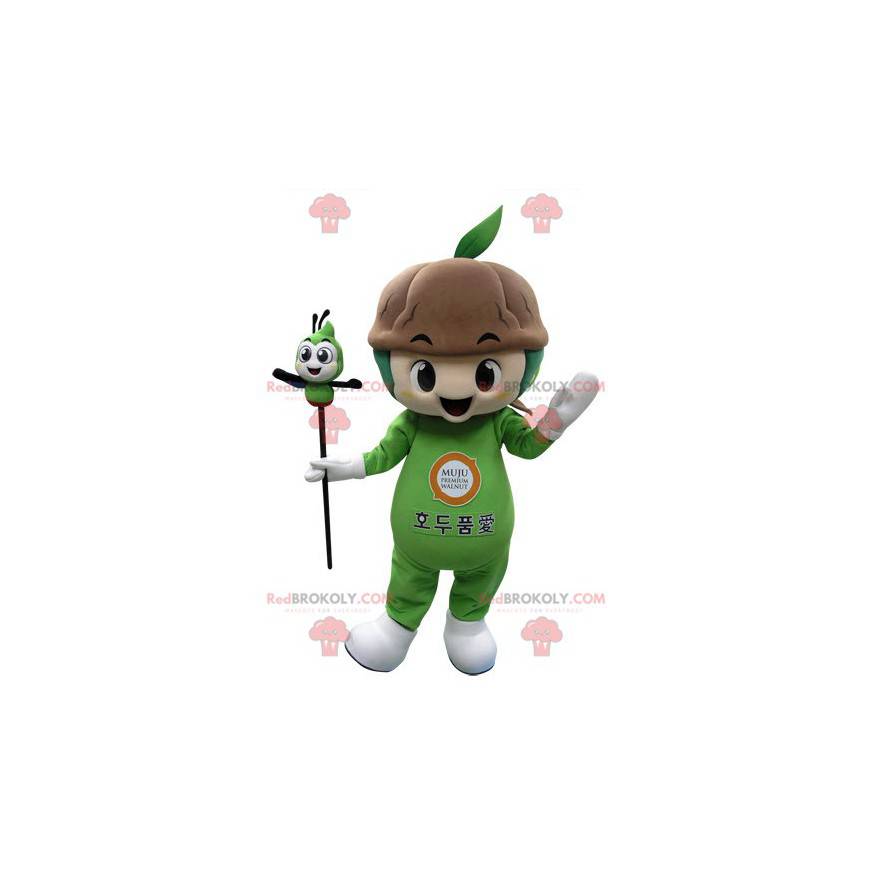 Groene plant mascotte met aarde - Redbrokoly.com