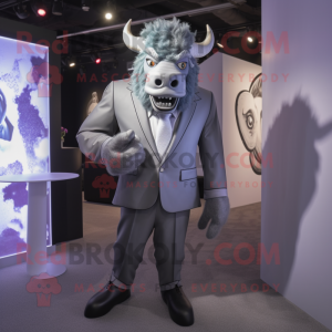 Silver Minotaur mascot costume character dressed with a Suit Jacket and Lapel pins