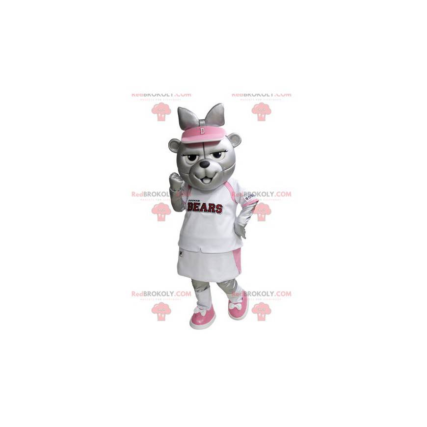 Mascota del oso gris en traje de tenis rosa y blanco -