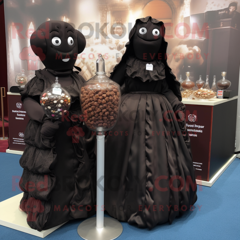 Black Chocolates mascot costume character dressed with a Evening Gown and Brooches Black Chocolates mascot costume character dressed with a Evening Gown and Brooches