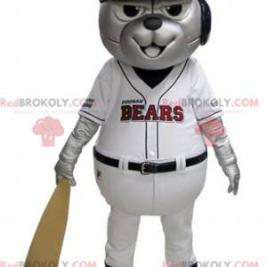 Gray bear mascot in blue and white baseball outfit -