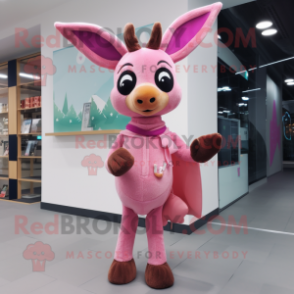 Pink Roe Deer mascot costume character dressed with a Cardigan and Clutch bags