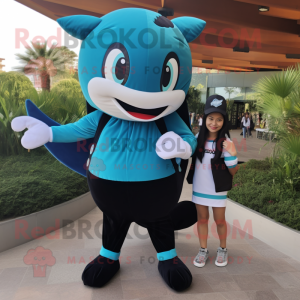 Turquoise Killer Whale mascot costume character dressed with a Mini Skirt and Backpacks