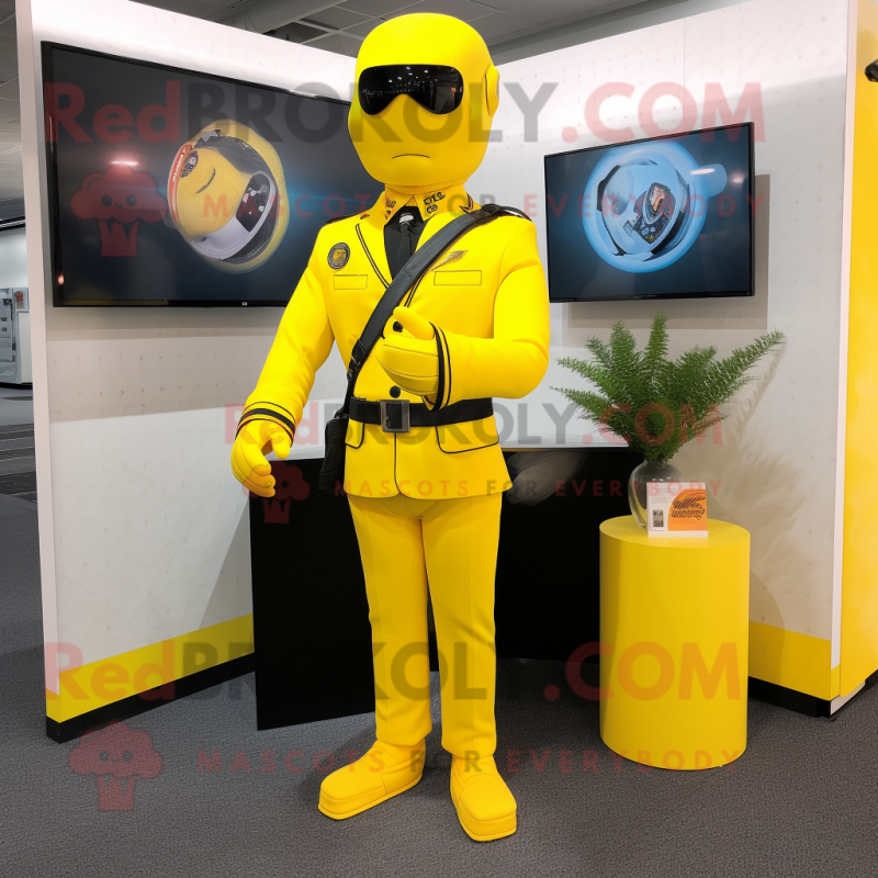 Lemon Yellow Gi Joe mascot costume character dressed with a Suit Jacket and Hair clips Lemon Yellow Gi Joe mascot costume character dressed with a Suit Jacket and Hair clips