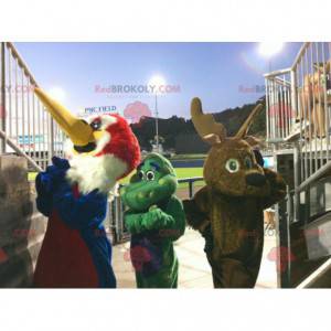 3 mascots a bird, a brown reindeer and a green dragon -