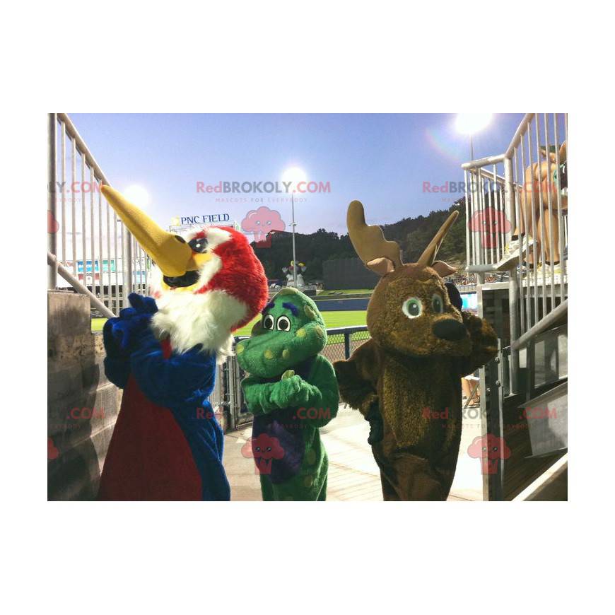 3 mascots a bird, a brown reindeer and a green dragon -