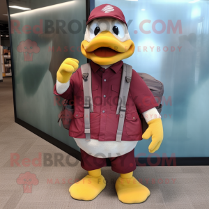 Maroon Duck mascot costume character dressed with a Dress Pants and Backpacks