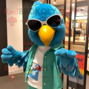 Turquoise Macaw mascot costume character dressed with a Dress Shirt and Sunglasses