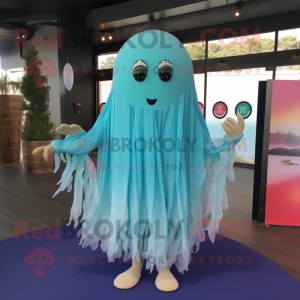 Cyan Jellyfish mascot costume character dressed with a Romper and Shawl pins