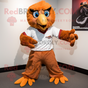 Rust Eagle mascot costume character dressed with a Bermuda Shorts and Mittens