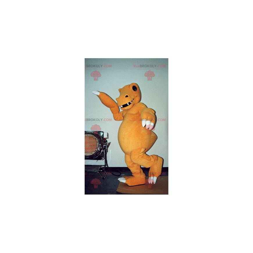 Mascota dinosaurio naranja y blanco muy realista y aterradora -