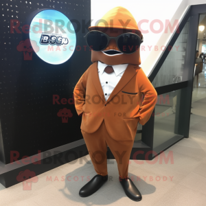 Rust Stingray mascot costume character dressed with a Suit Pants and Eyeglasses