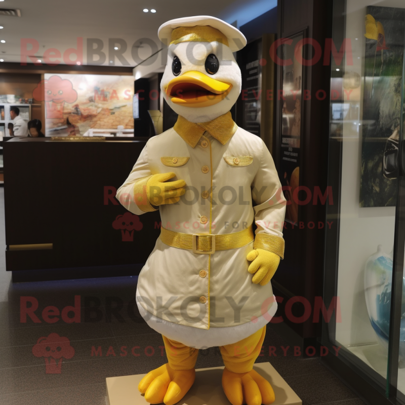 Gold Duck mascot costume character dressed with a Chinos and Brooches