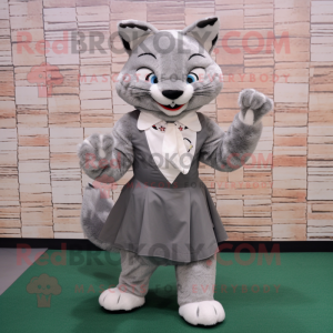 Gray Bobcat mascot costume character dressed with a Pleated Skirt and Lapel pins