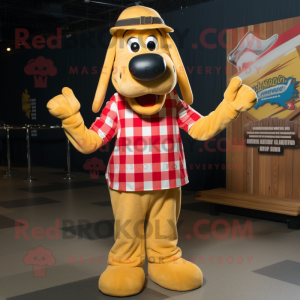 Gold Hot Dogs mascot costume character dressed with a Flannel Shirt and Hat pins