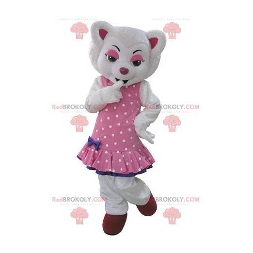 Hvid ulvmaskot klædt i en lyserød kjole med prikker -