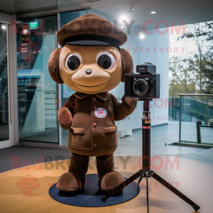 Brown Camera mascot costume character dressed with a Jeggings and Berets