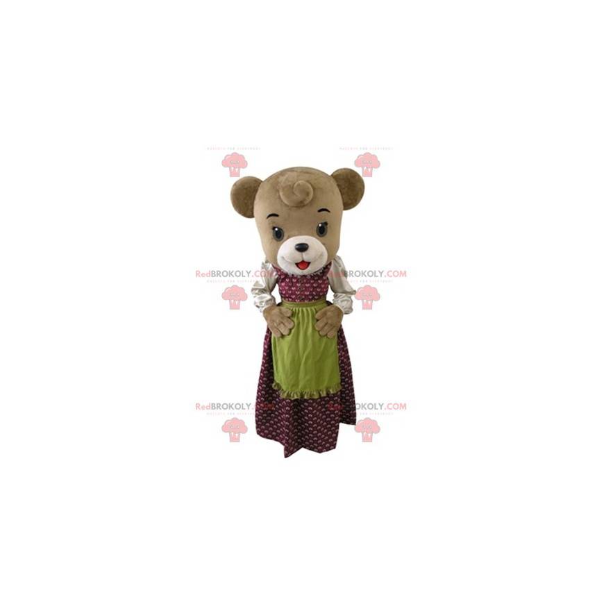 Mascotte d'ours marron habillé d'une robe avec un tablier -