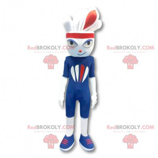 Biała maskotka królik sportowy ubrany na niebiesko -