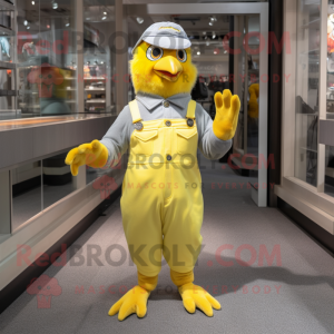 Silver Canary mascot costume character dressed with a Jumpsuit and Suspenders