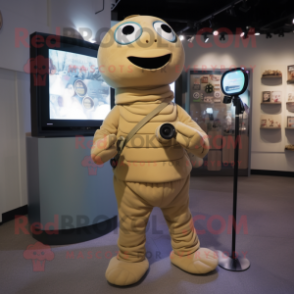 Tan Camera mascot costume character dressed with a Turtleneck and Keychains