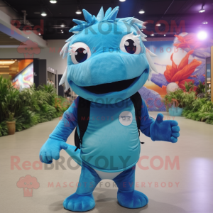 Sky Blue Barracuda mascot costume character dressed with a Long Sleeve Tee and Backpacks