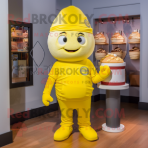 Lemon Yellow Cupcake mascot costume character dressed with a Henley Shirt and Messenger bags